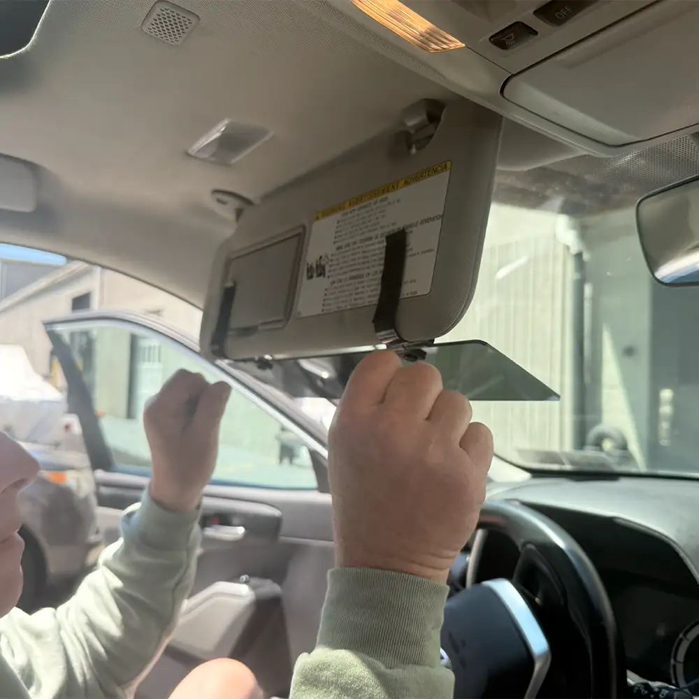 Glare Guard clipping onto a factory visor